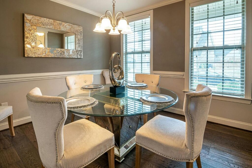 Glass-topped table for the dining set